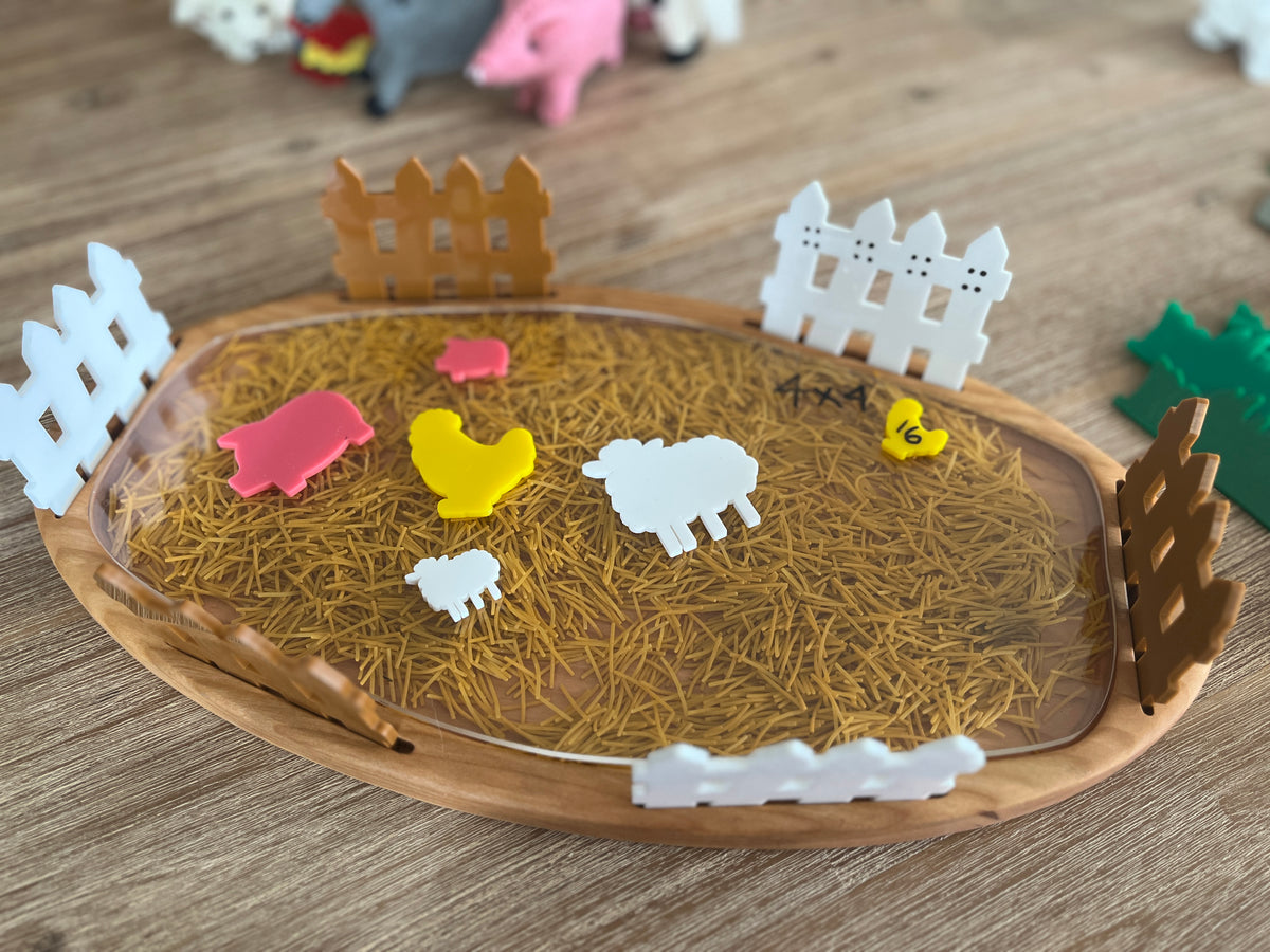 Little Dry Erasables - Farm Animal Parent & Kids featuring colorful parent and baby animal shapes including pig, chicken, and sheep on a wood tray with fence pieces, handcrafted, homeschool, education resources.