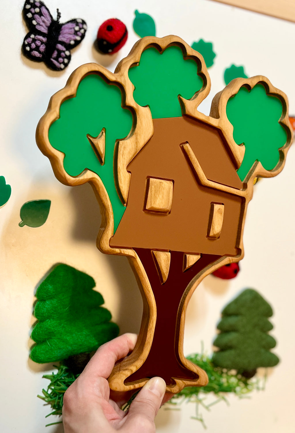 Handmade treehouse tray with dry erase inserts on a light background