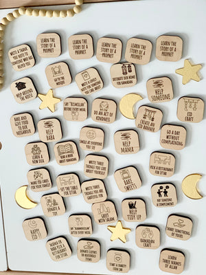 Wooden activity tiles with Ramadan-themed tasks and icons scattered on a white surface with wooden stars and crescent moons