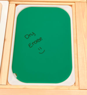 Green dry erase board with rounded edges and handwritten "Dry Erase" text and smiley on a white tray background