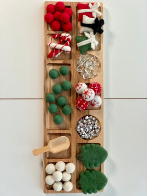 Extra large wooden sensory tray with compartments filled with felt balls, mini gifts, glass beads, and wooden scoop