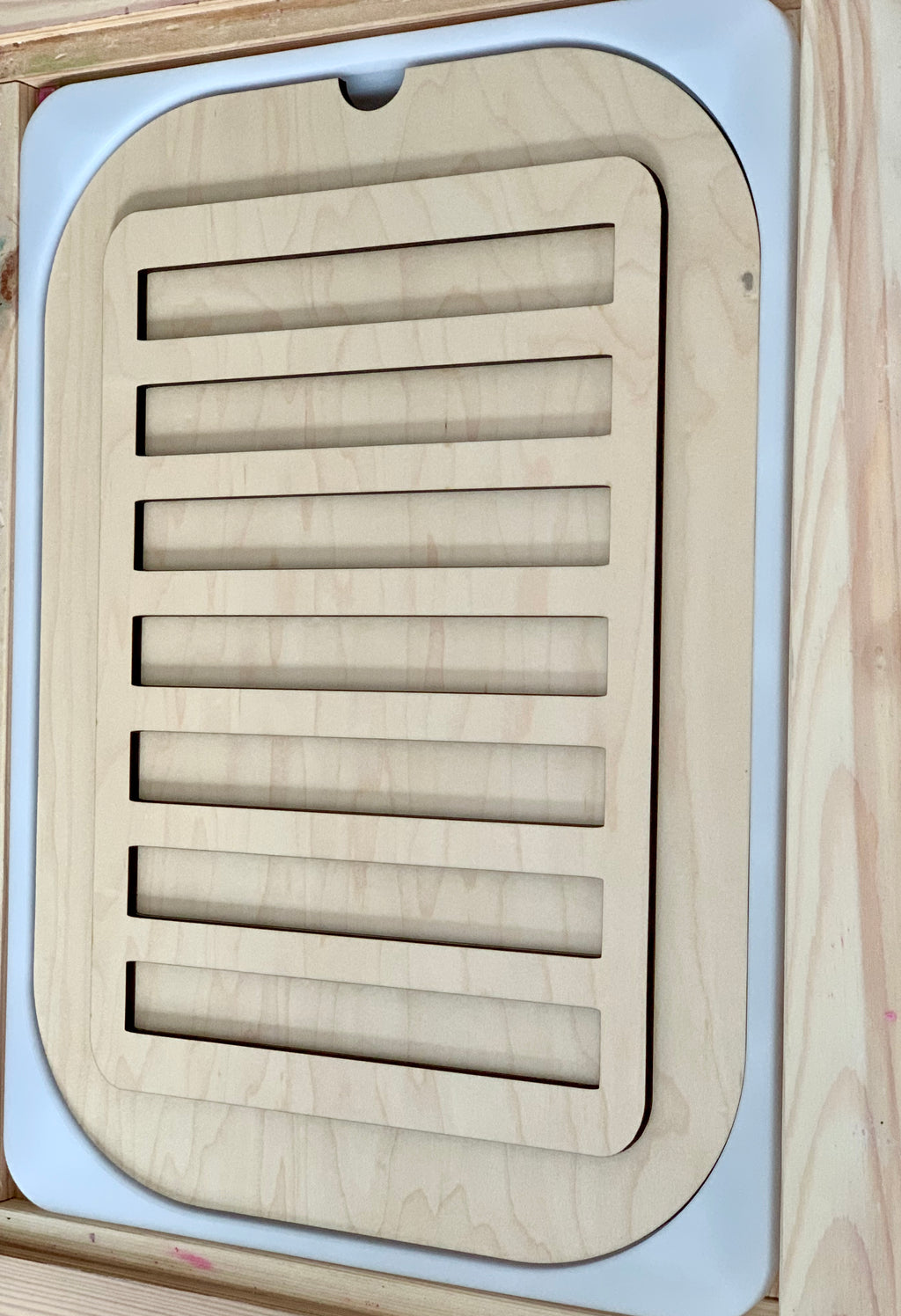Wooden stove top and oven insert with vented slats designed to fit Trofast Flisat bins on white base