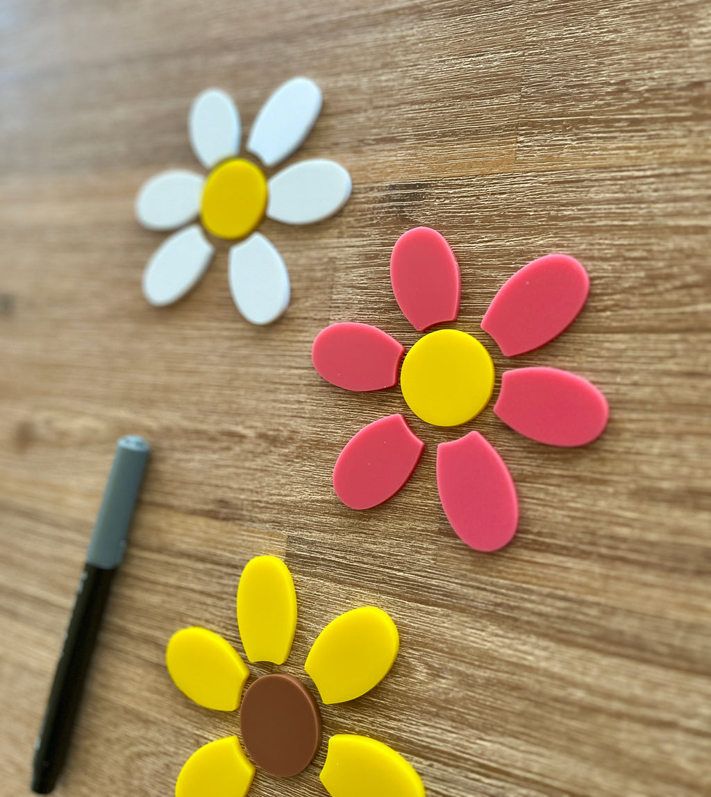 Little Dry Erasables - 7 Part Daisy Flowers; 3 Sets featuring colorful flower pieces in white, pink, and yellow for creative assembly and learning, handcrafted, homeschool, education resources.