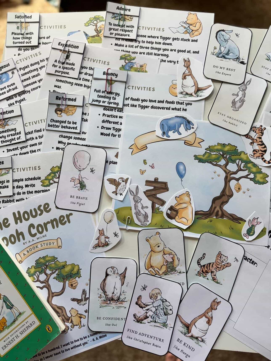 Layout of illustrated character cards, vocabulary flashcards, and activity sheets inspired by classic story scenes, presented with the Digital Download or Print & Bound - The House at Pooh Corner Book Study, handcrafted homeschool education resources.