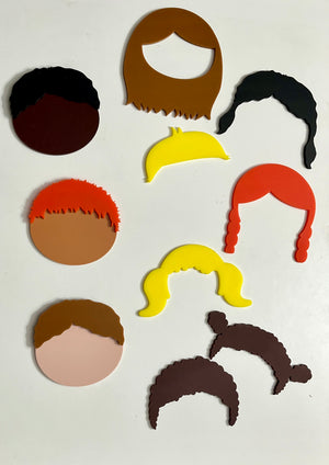 Assorted colorful flat face and hair cutouts in various styles and skin tones arranged on a white background