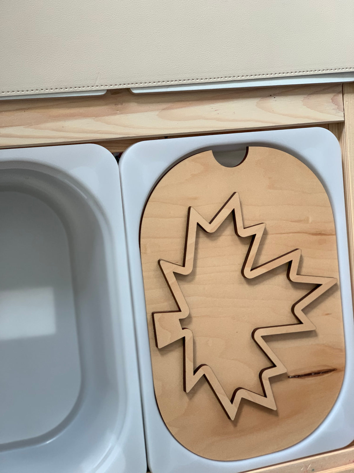 Small wooden maple leaf-shaped Flisat table top insert fitting Trofast Flisat bins in light maple plywood