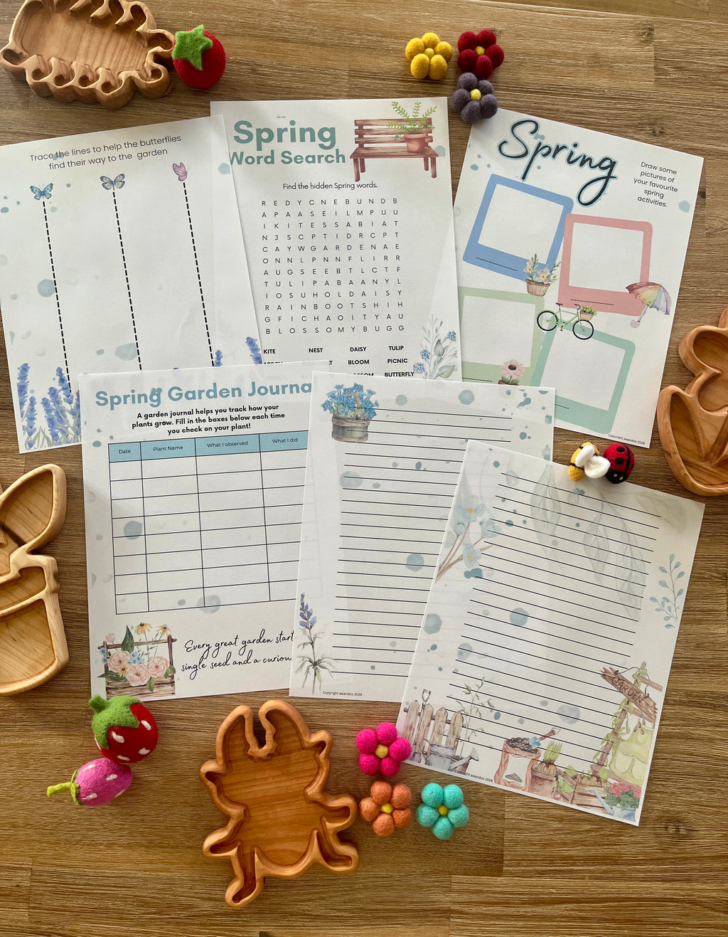 Printable spring-themed educational worksheets featuring garden journaling, word search, tracing, and drawing activities arranged with handcrafted wooden trays and felt sensory fillers as Digital Download | Spring Gardening Complete Unit Study with handcrafted homeschool education resources.