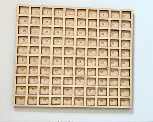 Laser cut wooden hundred frame sensory tray with 100 numbered squares arranged in 10 rows for early math learning