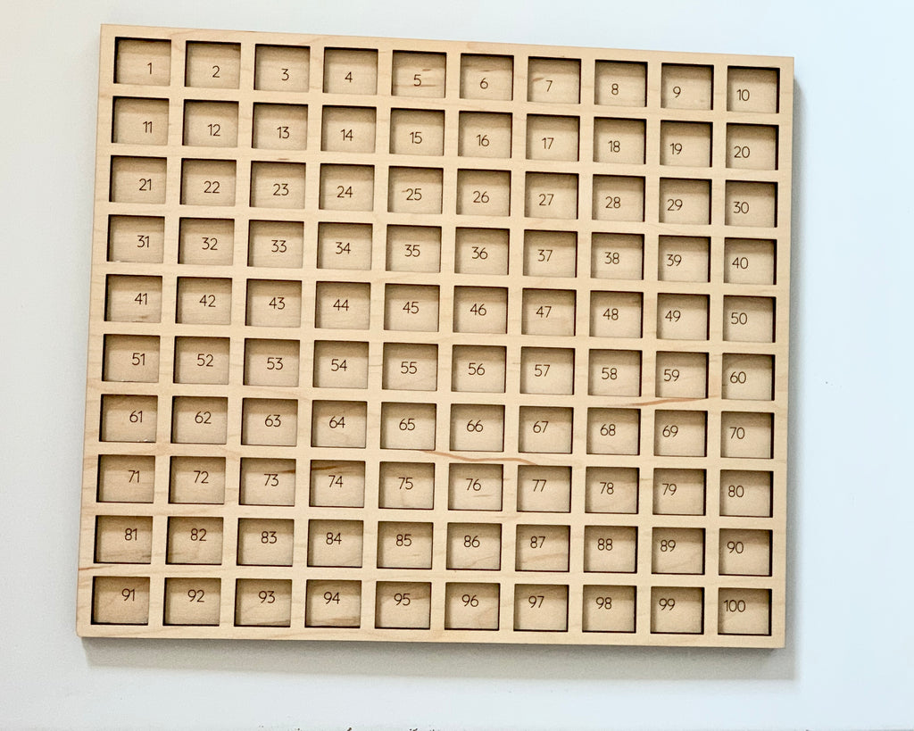 Laser cut wooden hundred frame sensory tray with 100 numbered squares arranged in 10 rows for early math learning