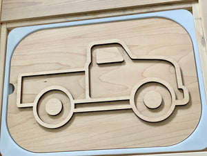 Light maple plywood truck-shaped insert with smooth rounded edges in a natural wood finish frame