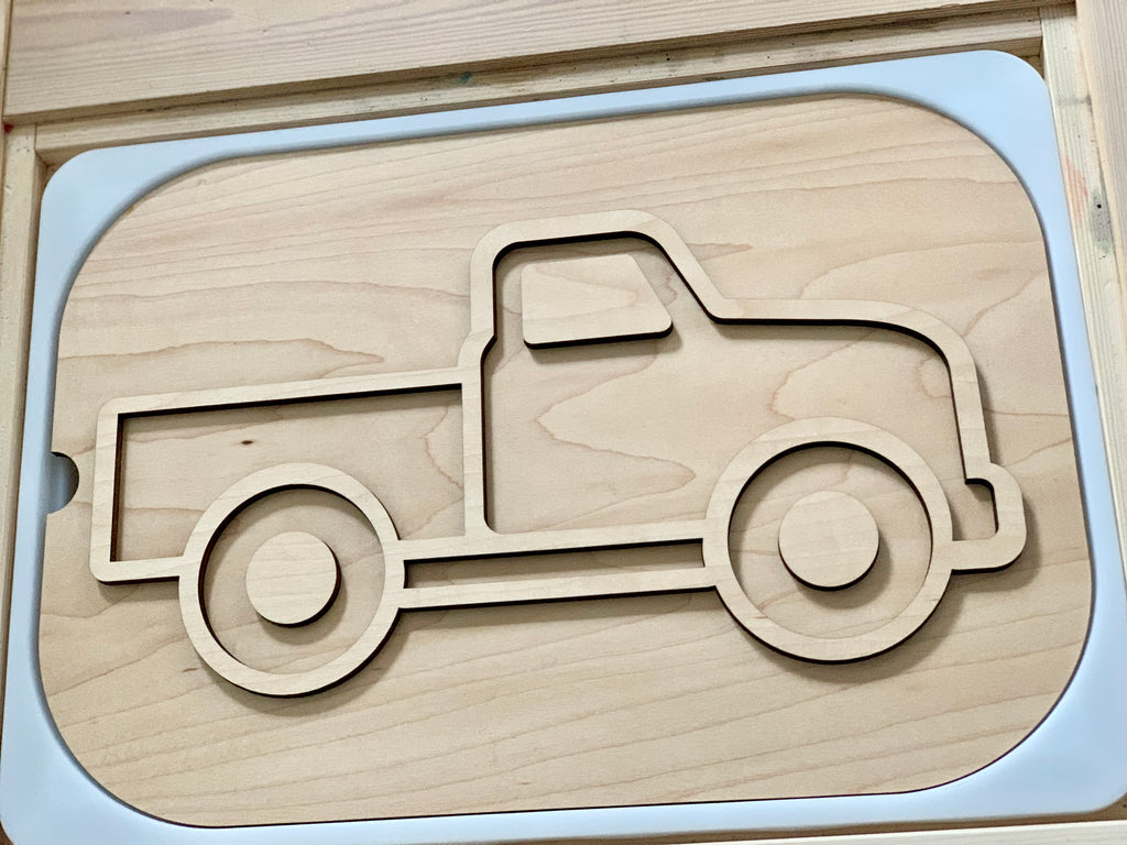 Light maple plywood truck-shaped insert with smooth rounded edges in a natural wood finish frame