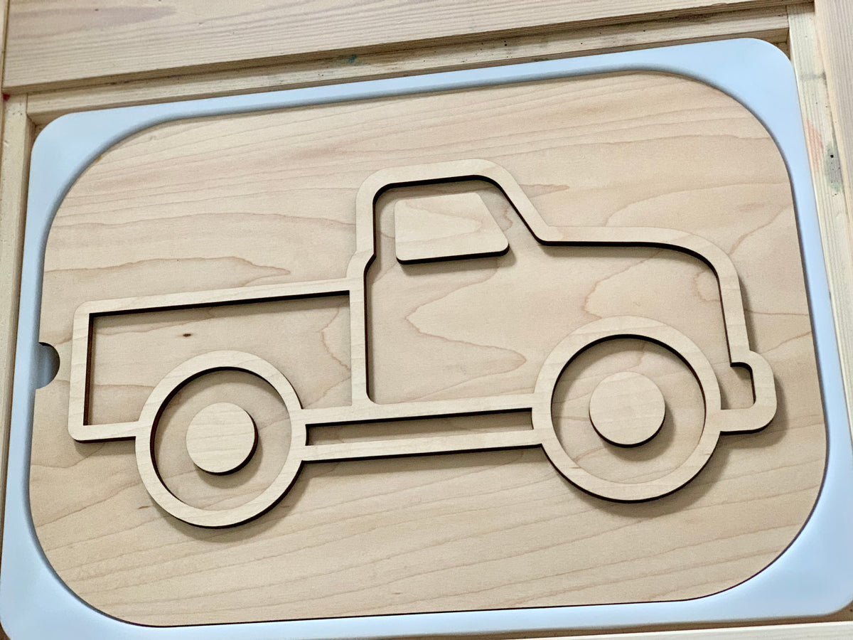 Light maple plywood truck-shaped insert with smooth rounded edges in a natural wood finish frame