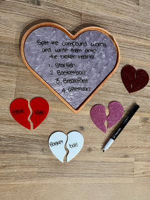 Large Heart Plate / Sensory Tray with a marbled dry erase surface displaying compound word activity instructions, surrounded by colorful broken heart pieces with words and a dry erase marker, handcrafted homeschool education resources.