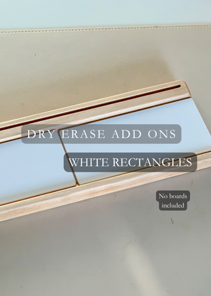 Three dry erase white rectangular panels set in a wooden tray on a beige surface with text overlays