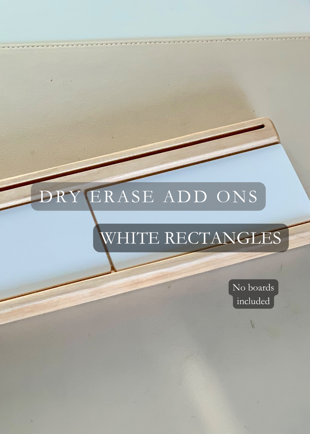 Three dry erase white rectangular panels set in a wooden tray on a beige surface with text overlays