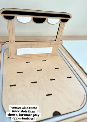 Natural wood playboard with laser-cut stand and multiple small slots for attaching interchangeable pieces