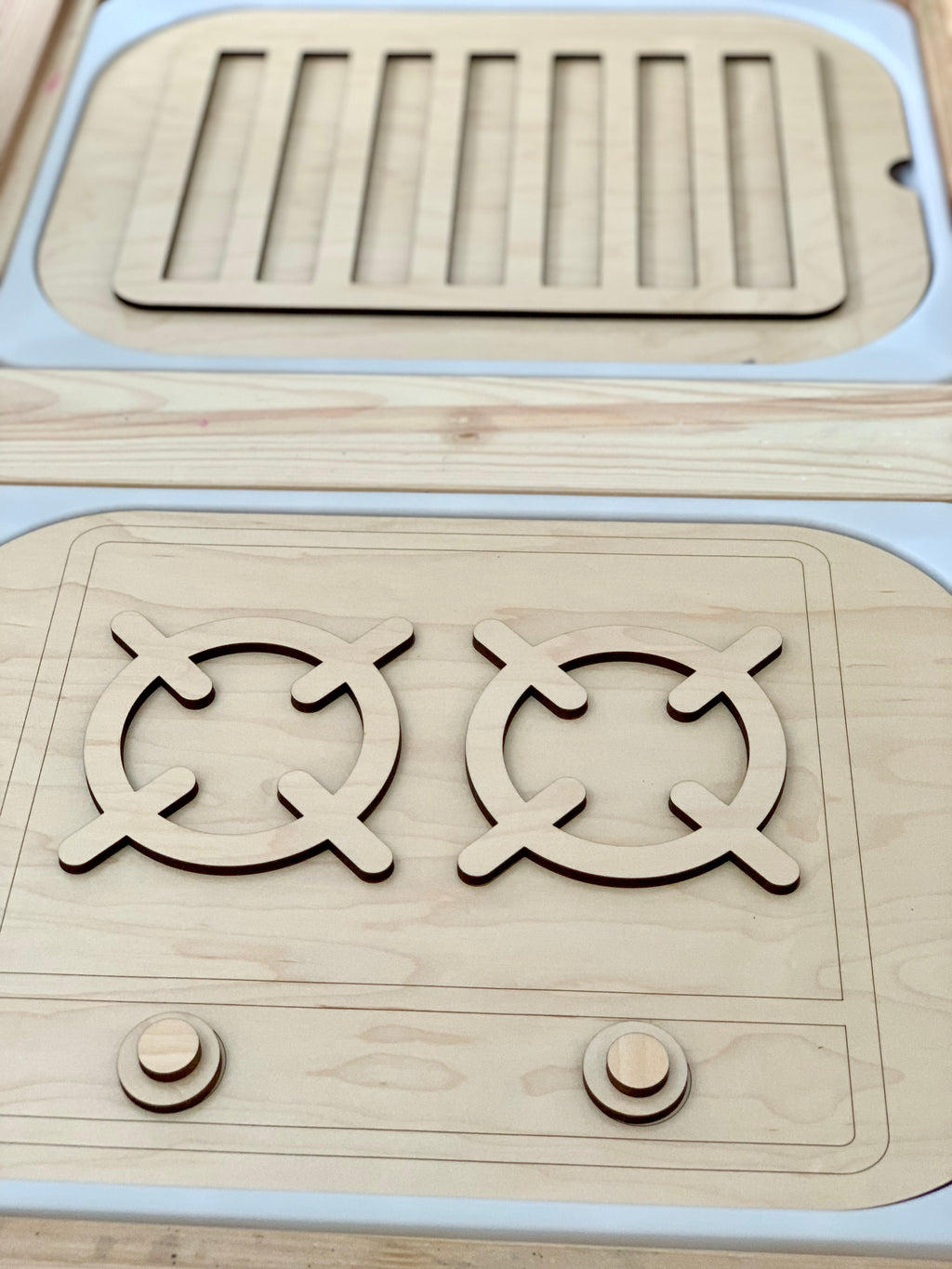 Wooden stove top and oven insert with turnable knobs made from premium maple plywood and acrylic layers