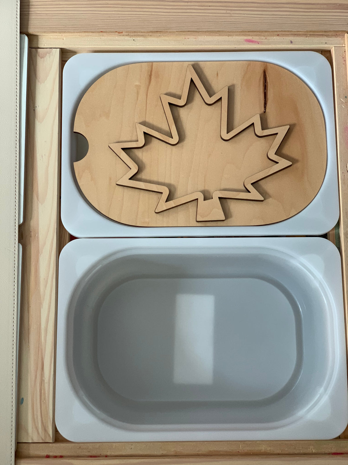 Small maple leaf-shaped wooden fillable Flisat table top insert with white plastic tray inside wooden frame
