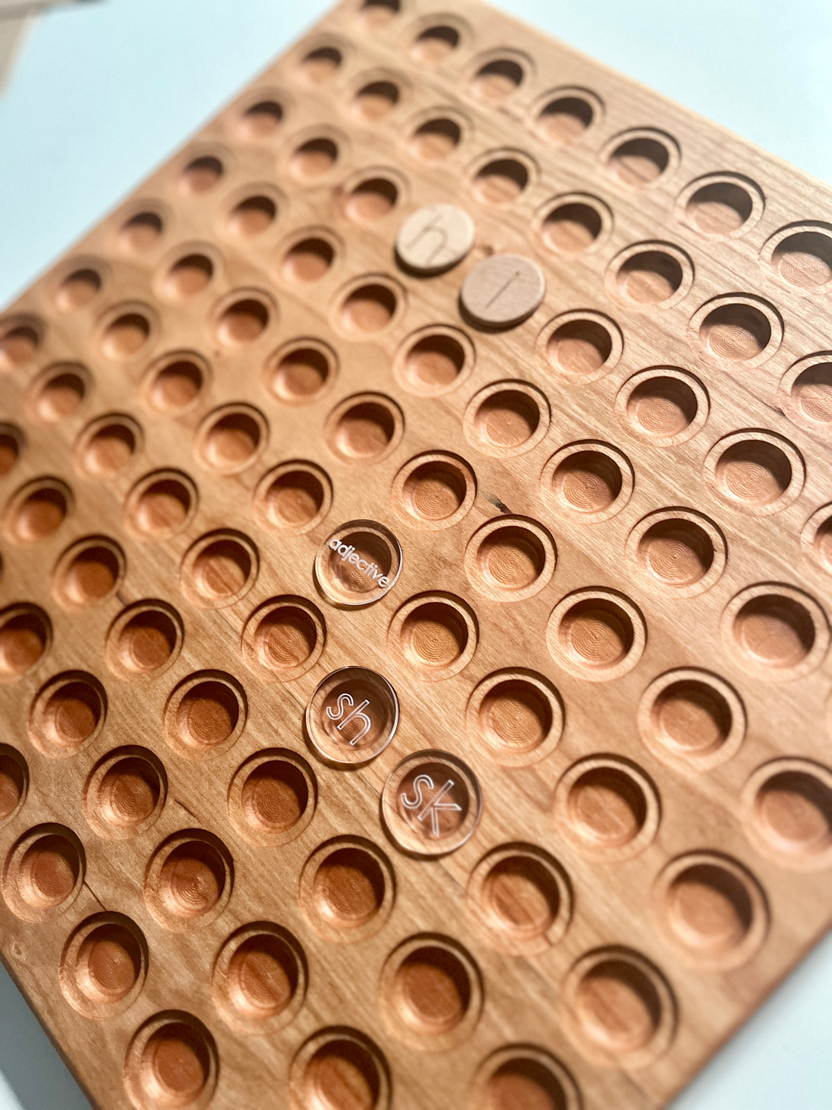 Wooden 100 Hundred Board Tray | Counting & Number Sense Learning Tray | Combos Available showing handcrafted wood tray with circular indentations and wooden letter tokens, unique homeschool educational resources.