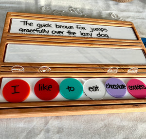 Wooden Sentence & Learning Tray | Open Ended Literacy Board | Math & Play featuring a handcrafted wood tray with colorful word circles, writable panels with a handwritten sentence, unique homeschool education resources.
