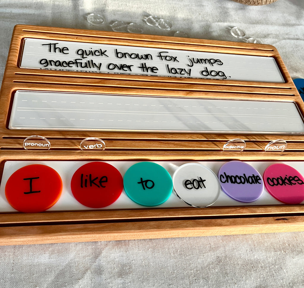 Wooden Sentence & Learning Tray | Open Ended Literacy Board | Math & Play featuring a handcrafted wood tray with colorful word circles, writable panels with a handwritten sentence, unique homeschool education resources.