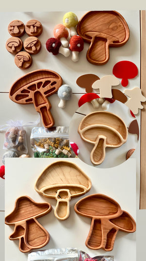 Wooden mushroom-shaped trays and stamps with colorful felt mushrooms and pasta on light background