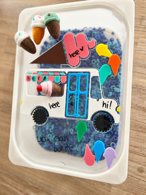 Dry Erasable Ice Cream Truck Flisat Table Bin Lid with colorful felt ice cream cones, blue sensory filler beads, and dry erase markers for interactive writing and play, handcrafted, homeschool, education resources.