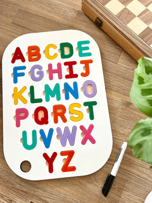 Acrylic Dry Erase Uppercase Alphabet Puzzle Flisat Table Top Insert with Both Rainbow and White Letters featuring colorful wooden letters on white base with black dry erase marker, handcrafted homeschool education resources.