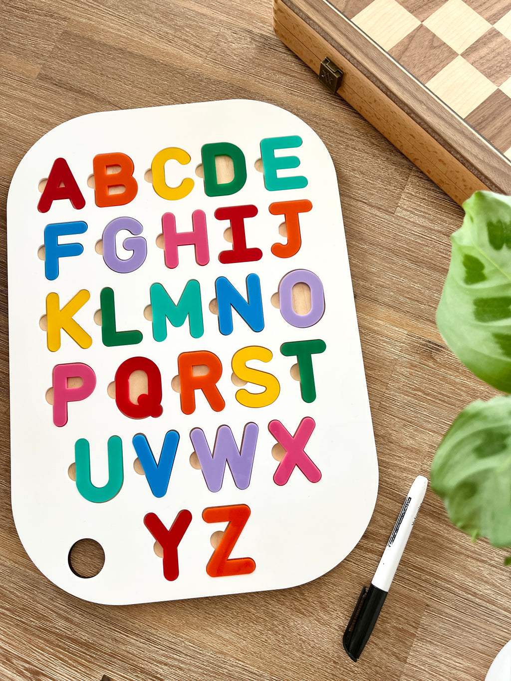 Acrylic Dry Erase Uppercase Alphabet Puzzle Flisat Table Top Insert with Both Rainbow and White Letters featuring colorful wooden letters on white base with black dry erase marker, handcrafted homeschool education resources.