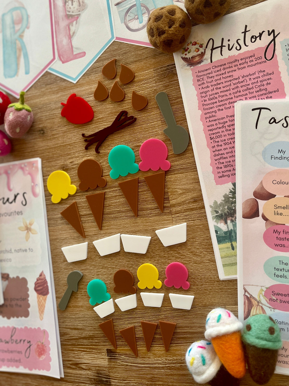Little Dry Erasables - Ice Cream Deluxe Set featuring handcrafted wood and acrylic ice cream cones, scoops, and toppings in bright colors arranged on a wood surface with educational homeschool resources and sensory toys.