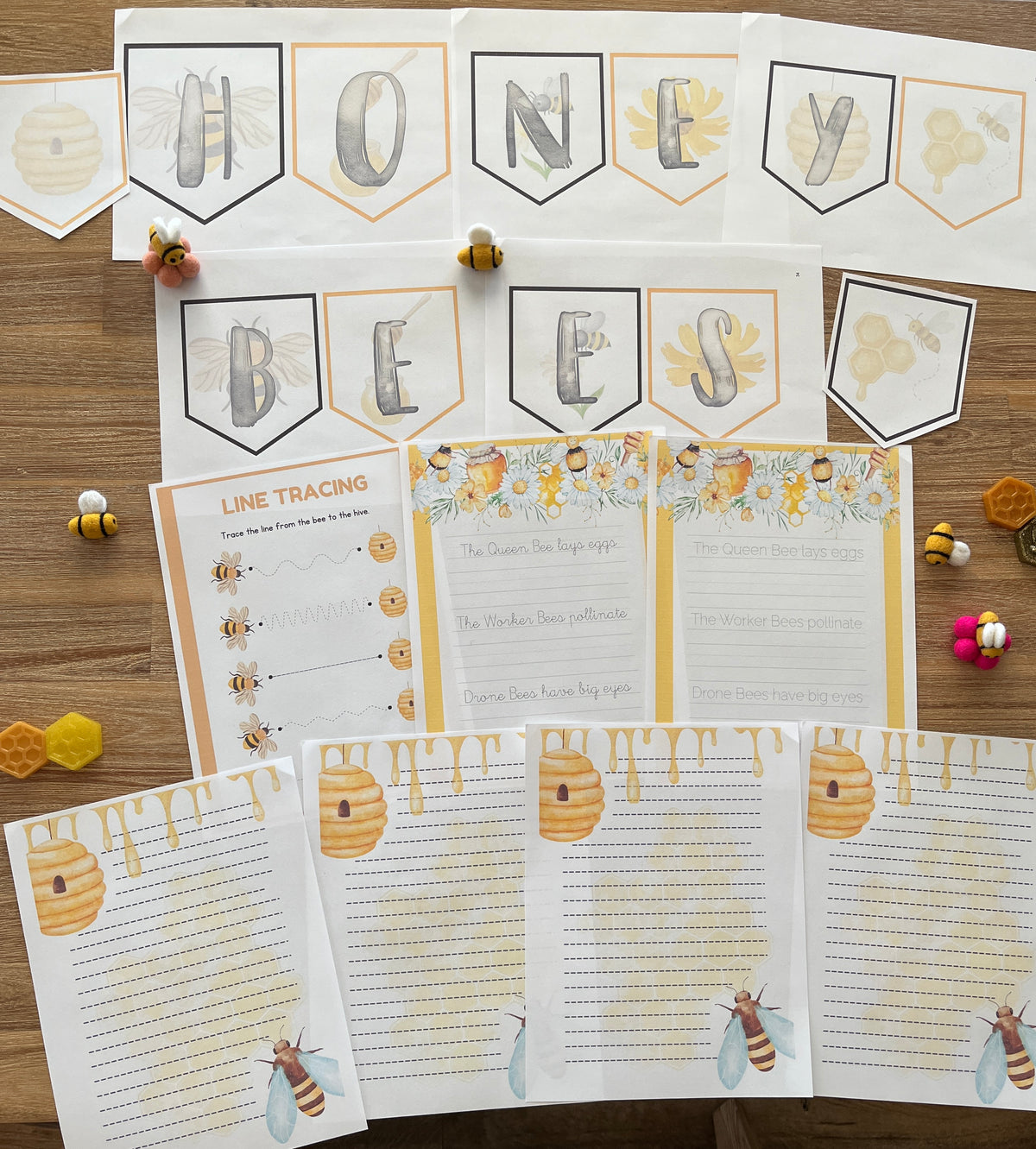 Digital Download | Bees Unit Study featuring printable bee-themed handwriting practice sheets, line tracing activity, and decorative honey and bee banner, handcrafted homeschool education resources.