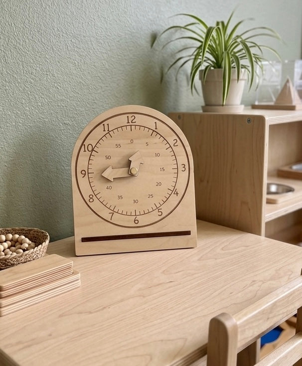 Free Standing Wooden Educational Learning Clock made of natural wood with movable hands, designed as a handcrafted homeschool educational resource for teaching time concepts.