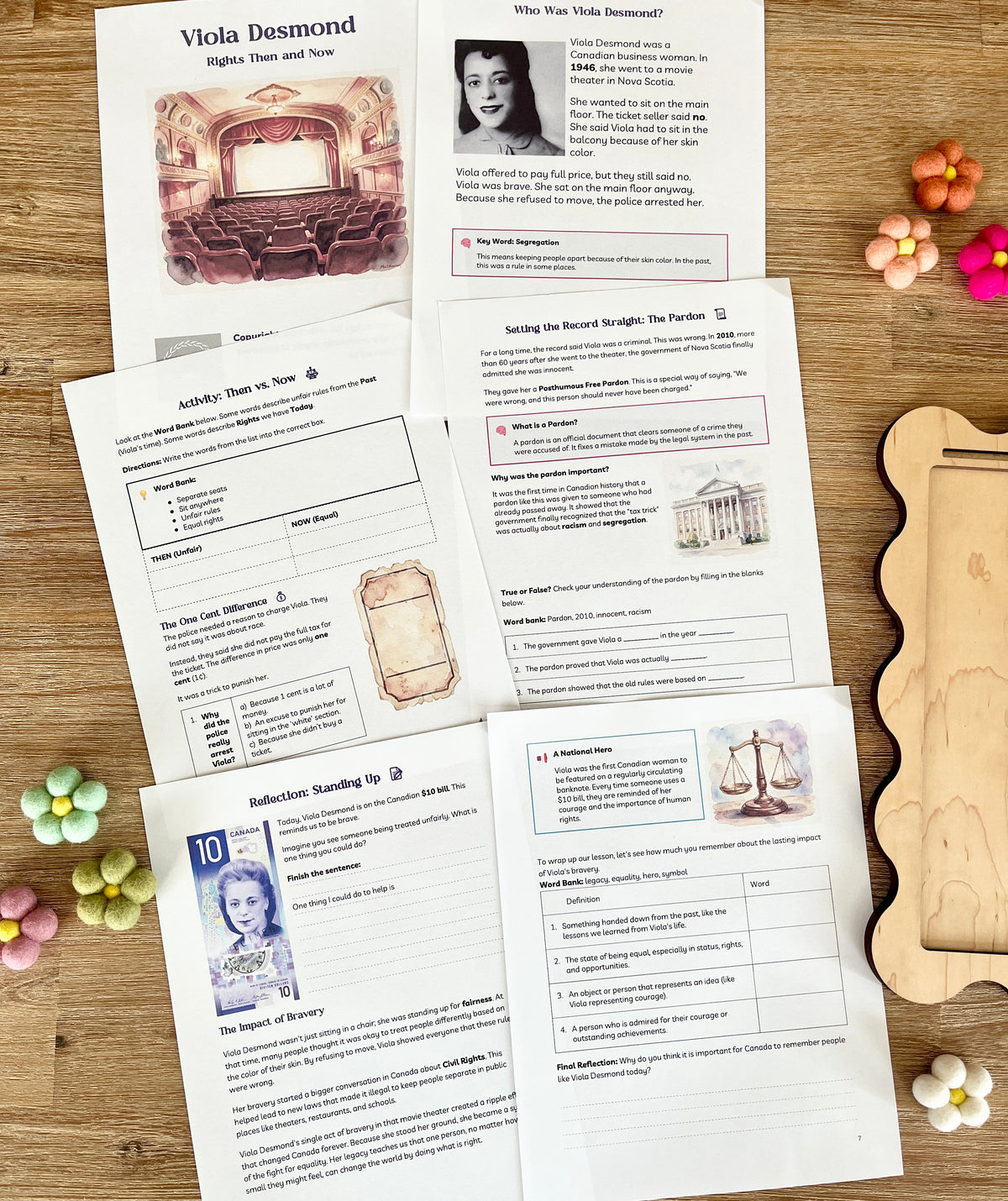 Digital Download | Viola Desmond Mini Study laid out on a wooden surface alongside colorful felt flower decorations and a wood tray, handcrafted homeschool education resources.