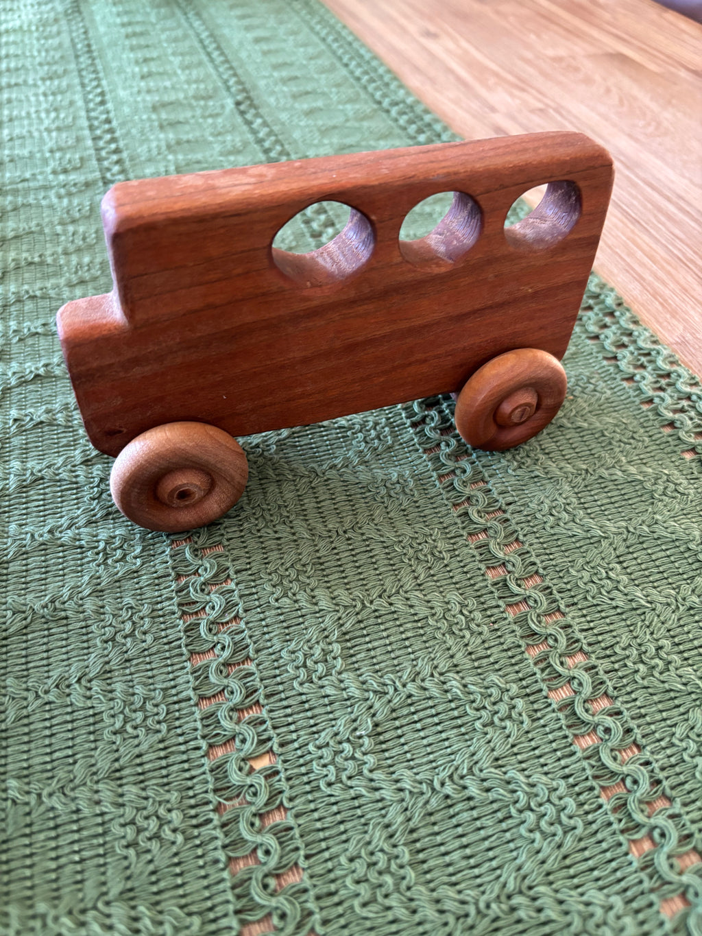 Ready to Ship, Push Cars, 10 Colours / Styles featuring a smooth handcrafted wooden bus toy with rounded wheels and cutout windows, unique homeschool educational resources and wood toys.