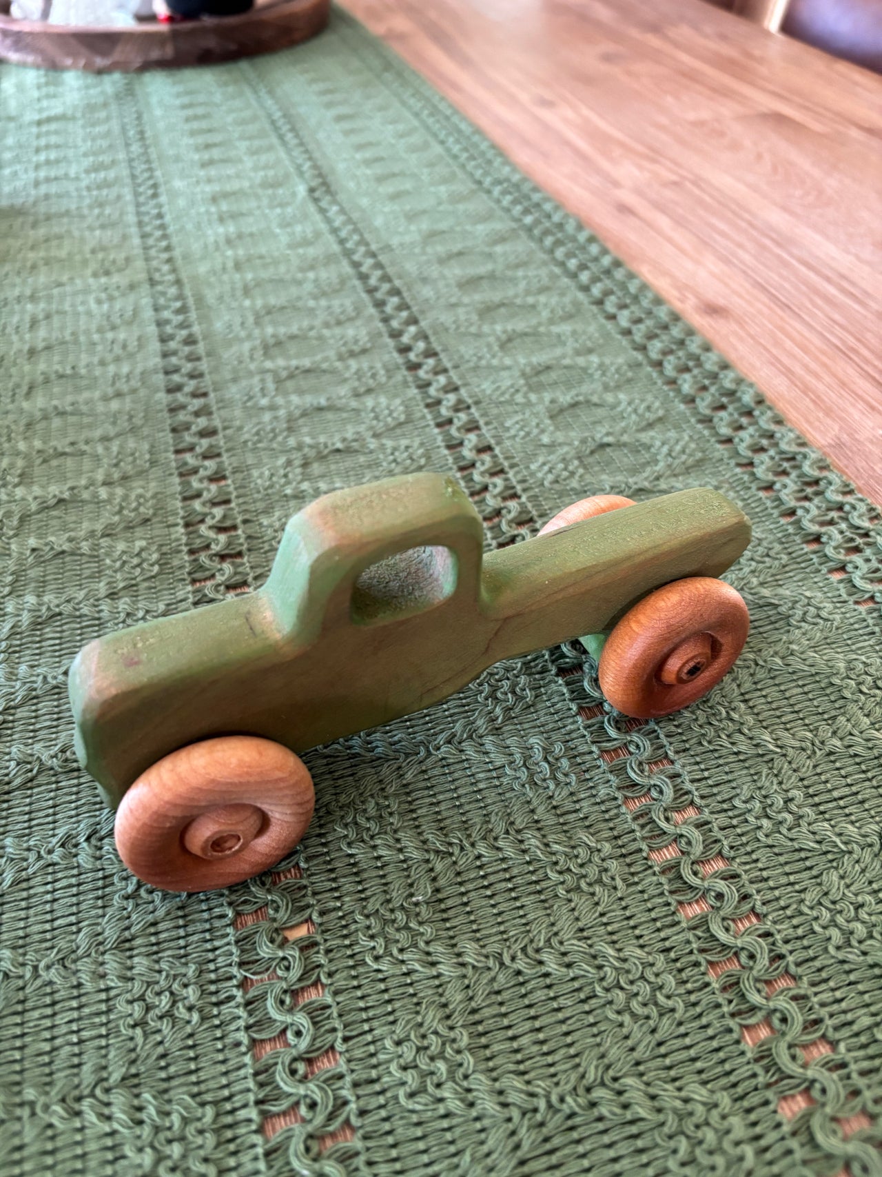 Ready to Ship, Push Cars, 10 Colours / Styles featuring a green handcrafted wooden toy car with natural wood wheels, designed as unique homeschool educational resources and wood toys.