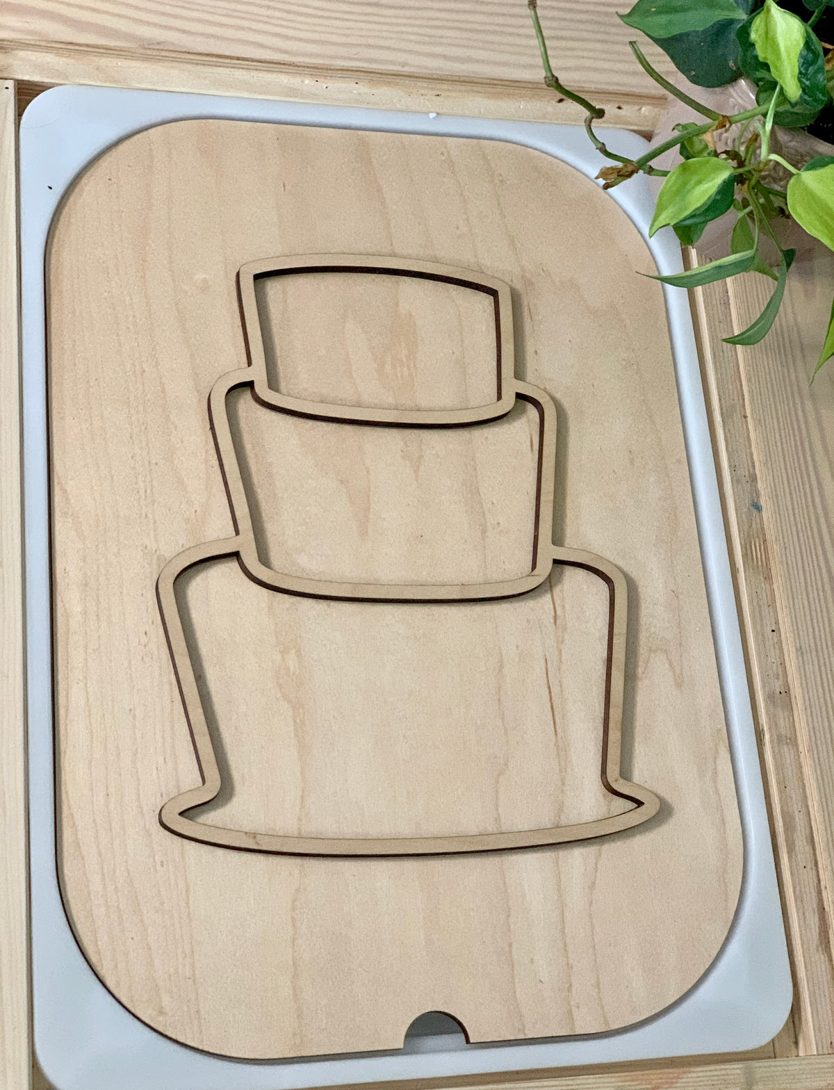 Maple plywood fillable cake-shaped Flisat table top insert designed to fit large Flisat bin with three-tier outline