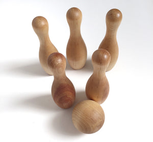Natural wood bowling set for toddlers with five pins and a ball, perfect Montessori and daycare toy gift.