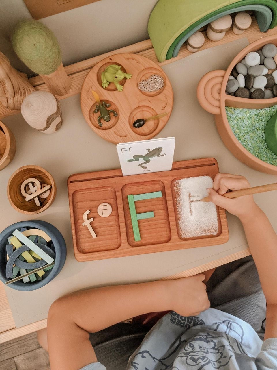 Wooden three section CVC tray with sand, letters, and flash card for sensory letter formation activity
