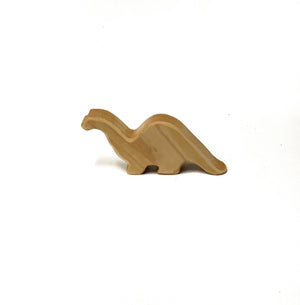 Small baby long neck brachiosaurus wood toy figurine carved from natural light wood on white background