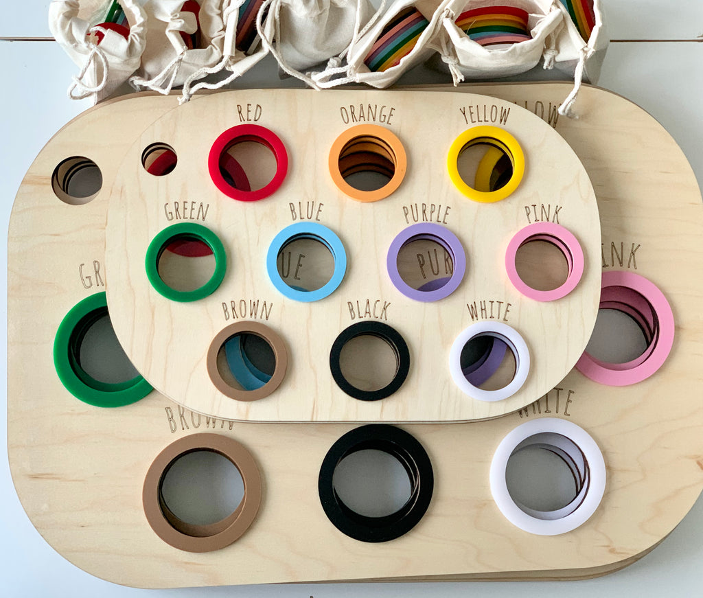 Maple plywood colour sorting table bin lid with painted circular cutouts for red, orange, yellow, green, blue, purple, pink, brown, black, and white balls