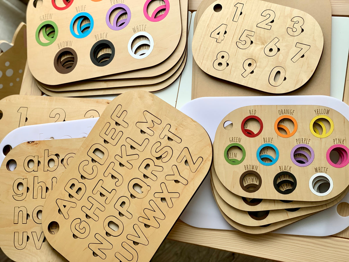 Maple plywood alphabet, number, and color matching puzzle inserts with white and maple acrylic pieces for Flisat bins