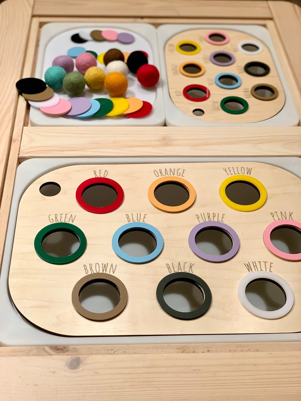 Maple plywood colour sorting Flisat table bin lid with matching felt balls in various colors on natural wood surface