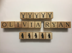 Customizable 2-inch wooden blocks with letters and animal silhouettes, personalized for names Olivia and Ryan.