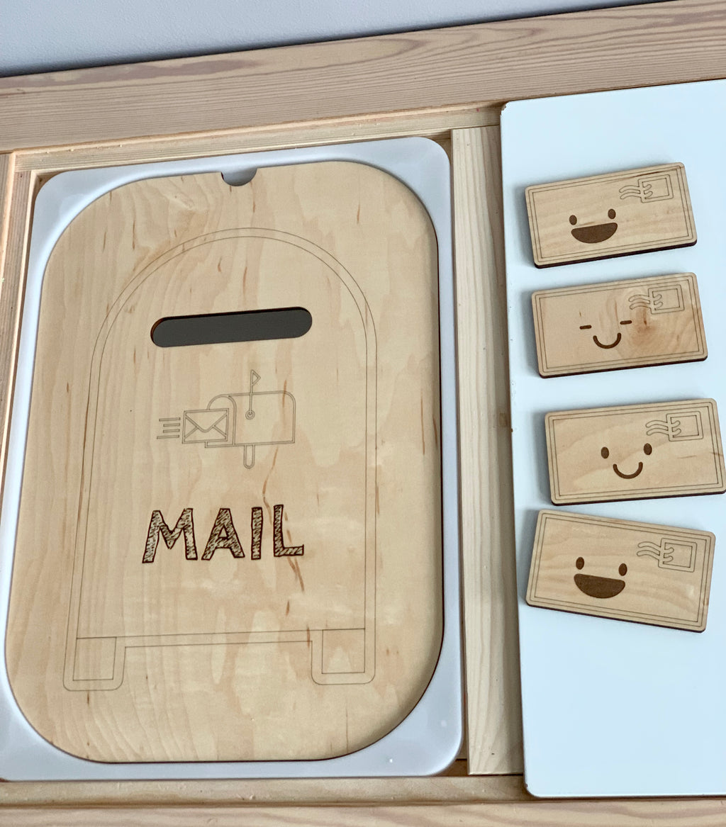 Maple plywood mailbox post box tabletop insert with slot and four wooden smiling envelope pieces on white and wood background
