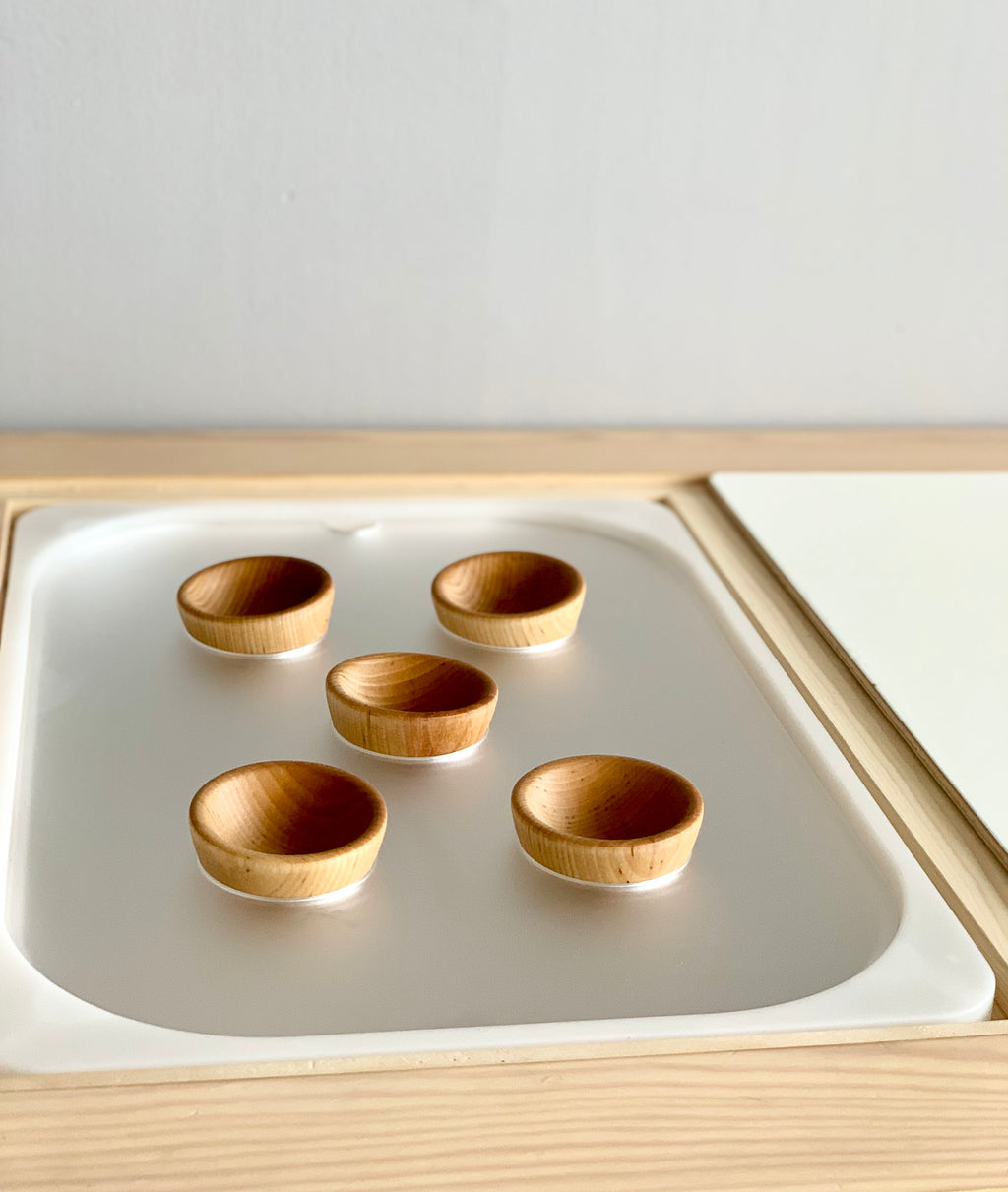 Maple plywood Tinker Pot Flisat table top insert with five small round wooden bowls on white surface