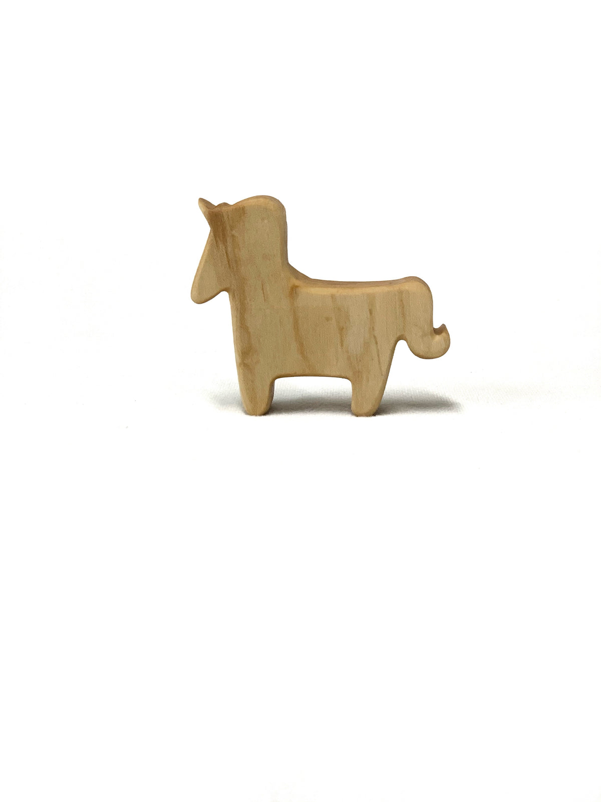 Small natural wooden unicorn toy figurine with smooth edges on white background