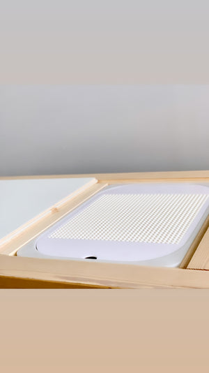 White acrylic Flisat tabletop insert with Lego base and dry erasable surface in natural wood frame
